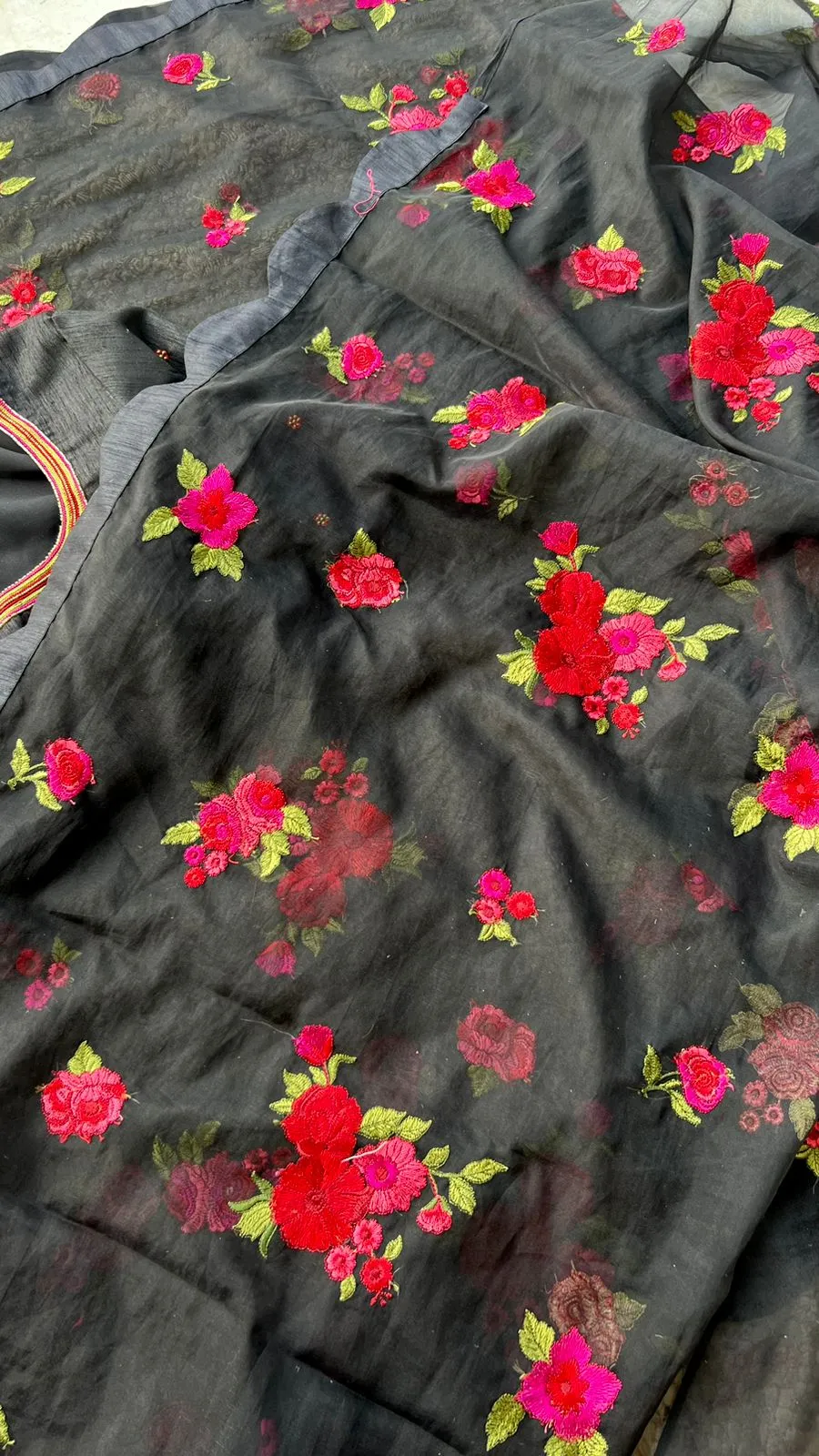 Black organza saree with black handwork blouse