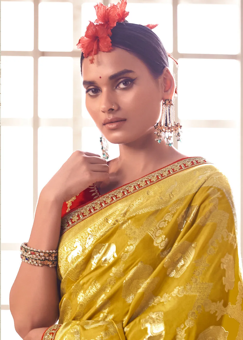 Canary Yellow Woven Dola Silk Saree with Contrast Embroidered Border