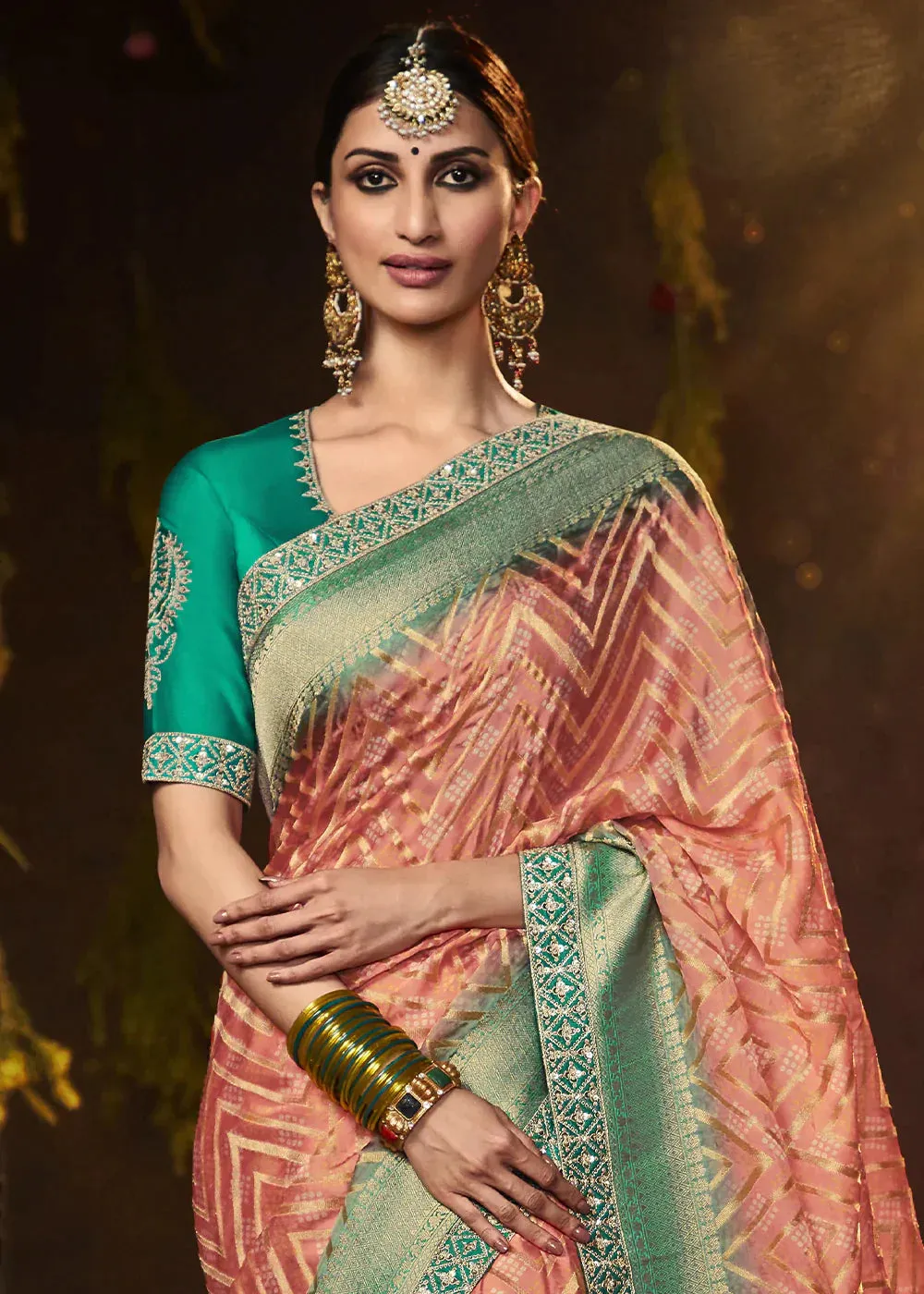 Salmon Pink Zari Weaving Georgette Silk Saree with Embroidery Designer Blouse