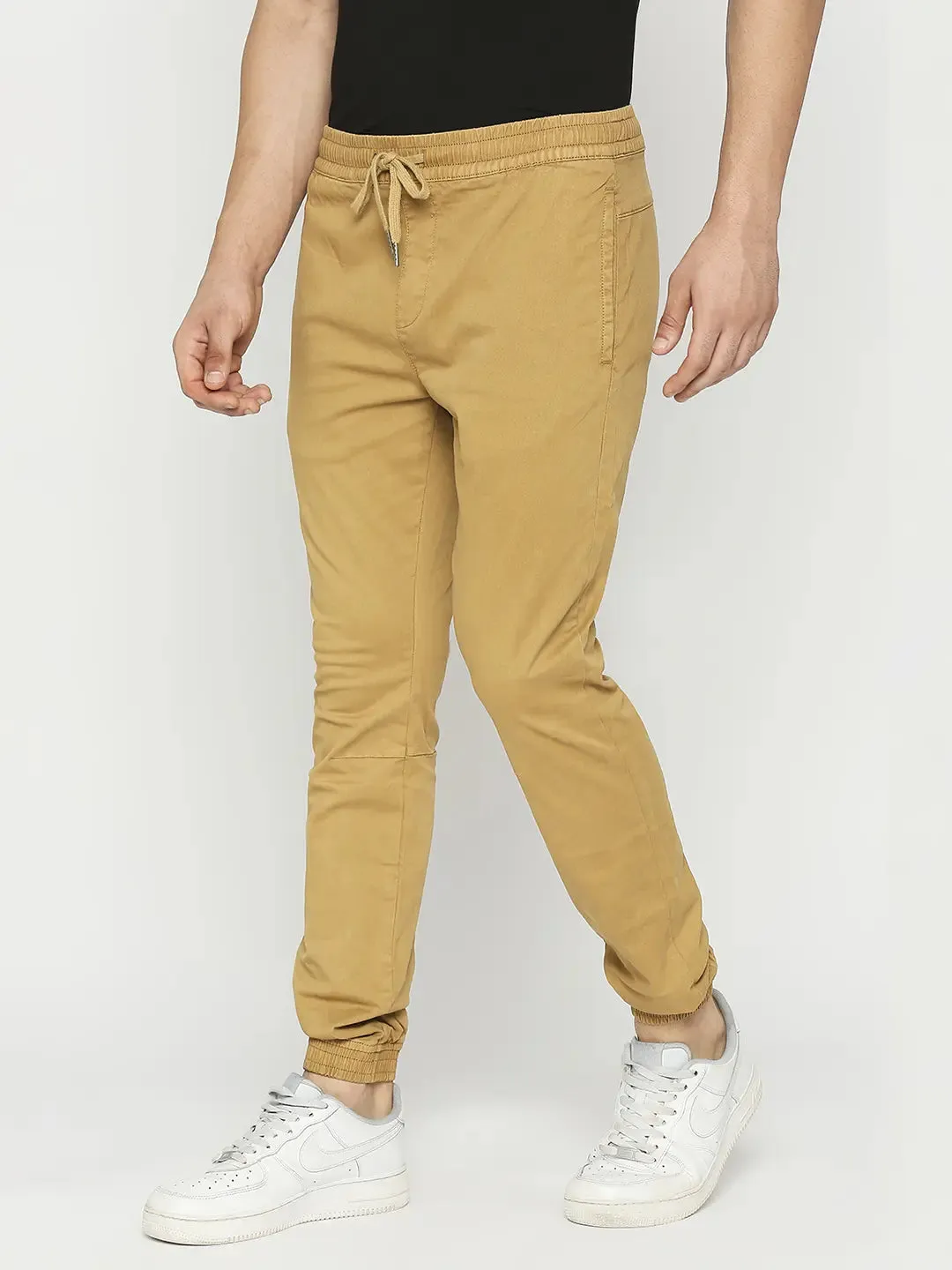 Spykar Men Beige Lycra Slim Fit Ankle Length Plain Trousers